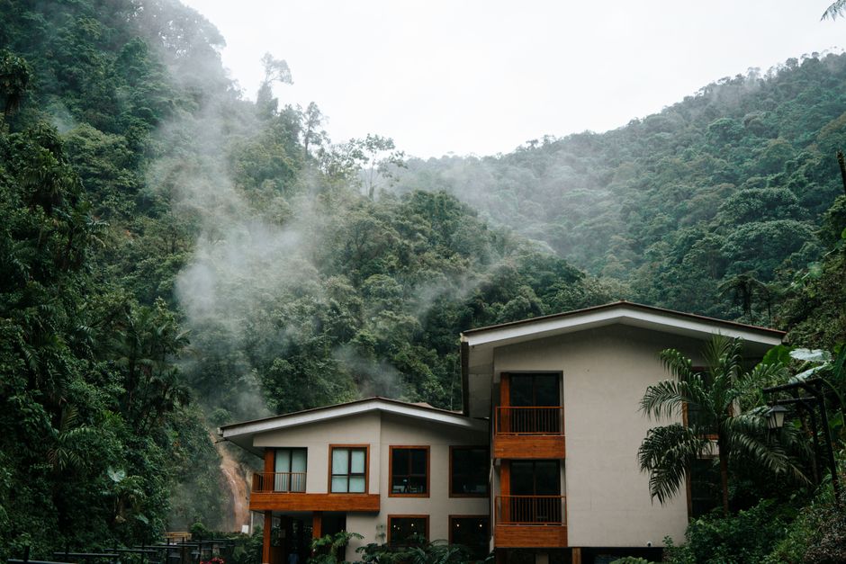 Modern house nestled in misty tropical forest, Santa Rosa de Cabal, Colombia.