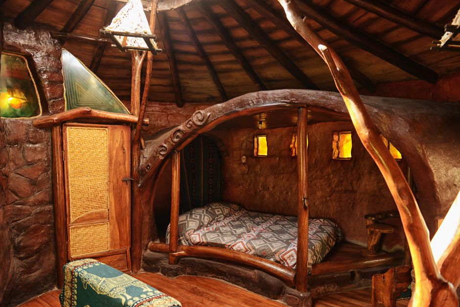 Cozy rustic cabin interior with eco-friendly design, wooden accents, and warm lighting creating a cozy atmosphere.