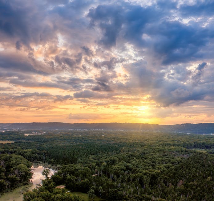 Breathtaking sunset over lush countryside and hills in Kellogg, Minnesota, USA.